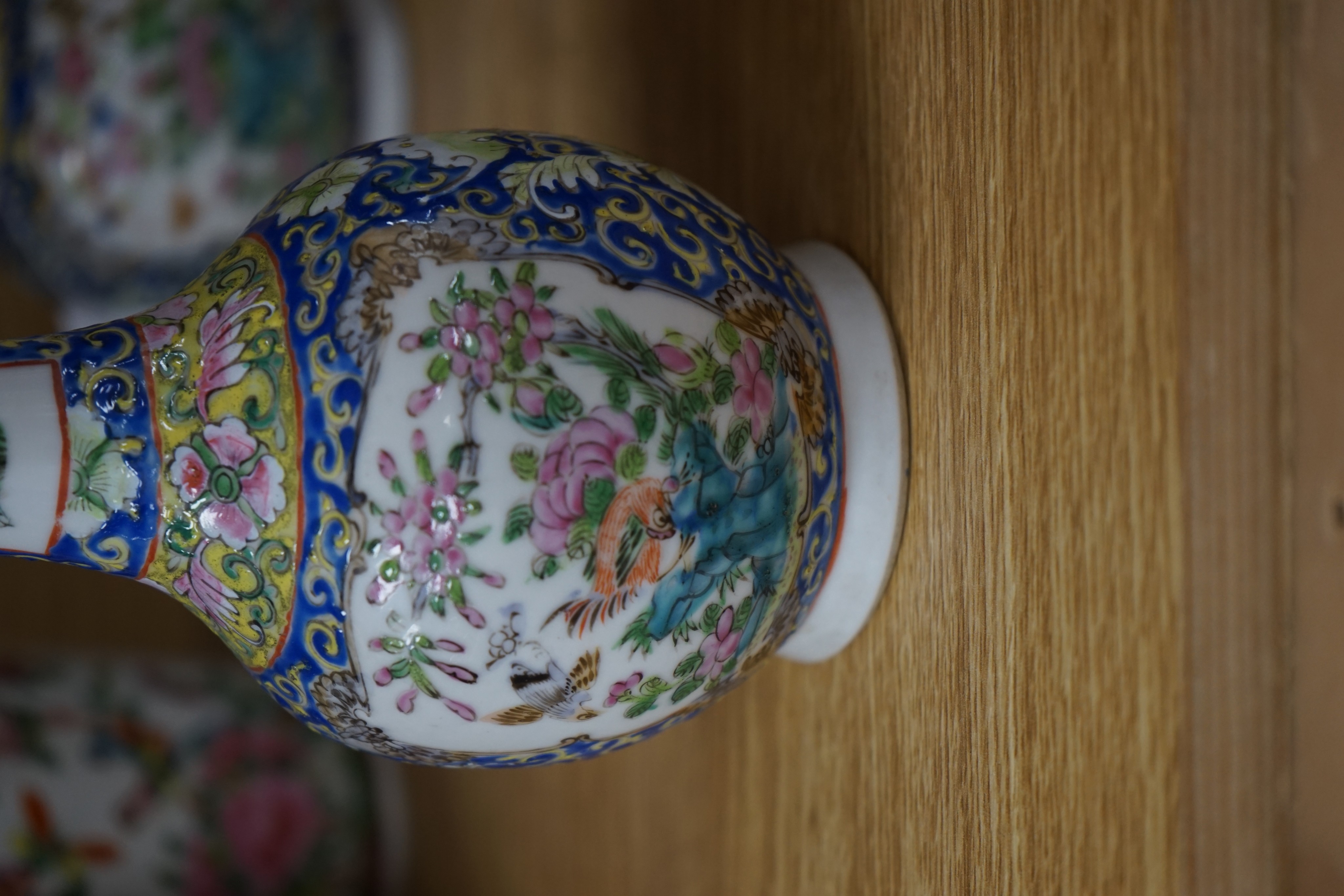 Four 19th century Chinese famille rose vases, 21cm